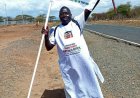 Ex-Chief Walks 65km in White Kanzu For Forgotten Late HERO Athlete Bartonjo Rotich