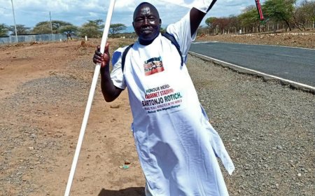 Ex-Chief Walks 65km in White Kanzu For Forgotten Late HERO Athlete Bartonjo Rotich